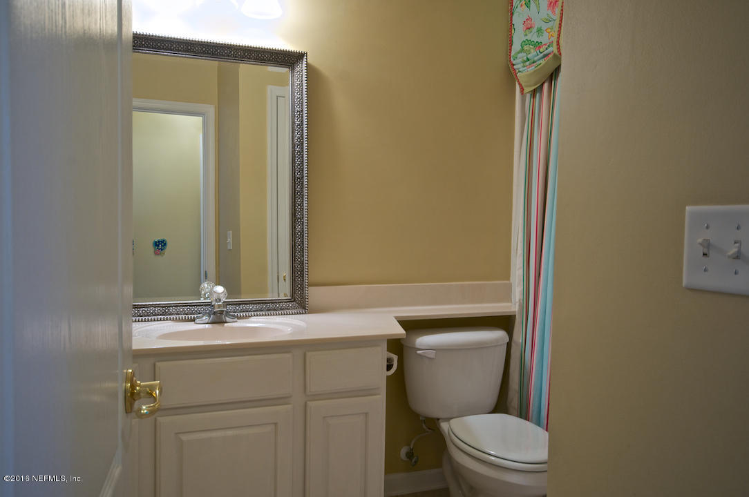 473 Big Tree Road Ponte Vedra Beach, FL 32082 - Photo 14 of 21 a bathroom with a toilet a sink and mirror