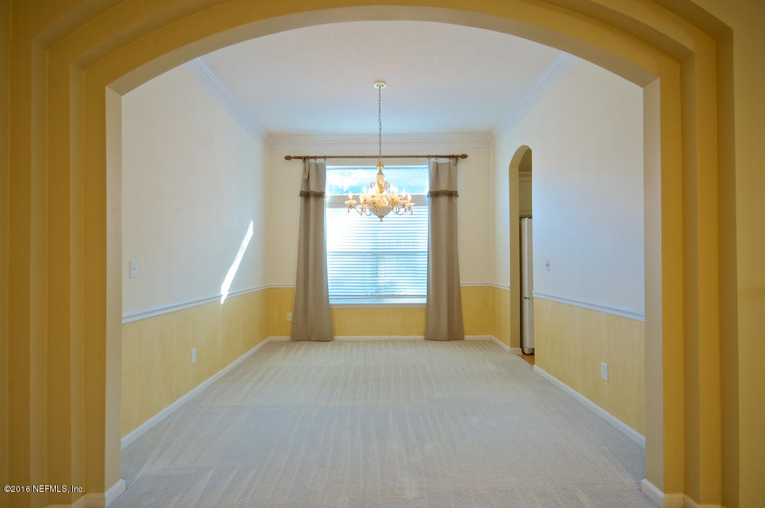 473 Big Tree Road Ponte Vedra Beach, FL 32082 - Photo 5 of 21 a view of a room with windows and chandelier