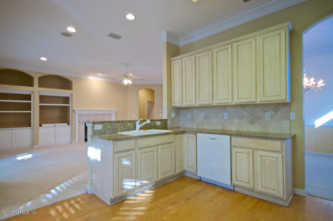 473 Big Tree Road Ponte Vedra Beach, FL 32082 - Photo 7 of 21 a kitchen with a sink cabinets and window
