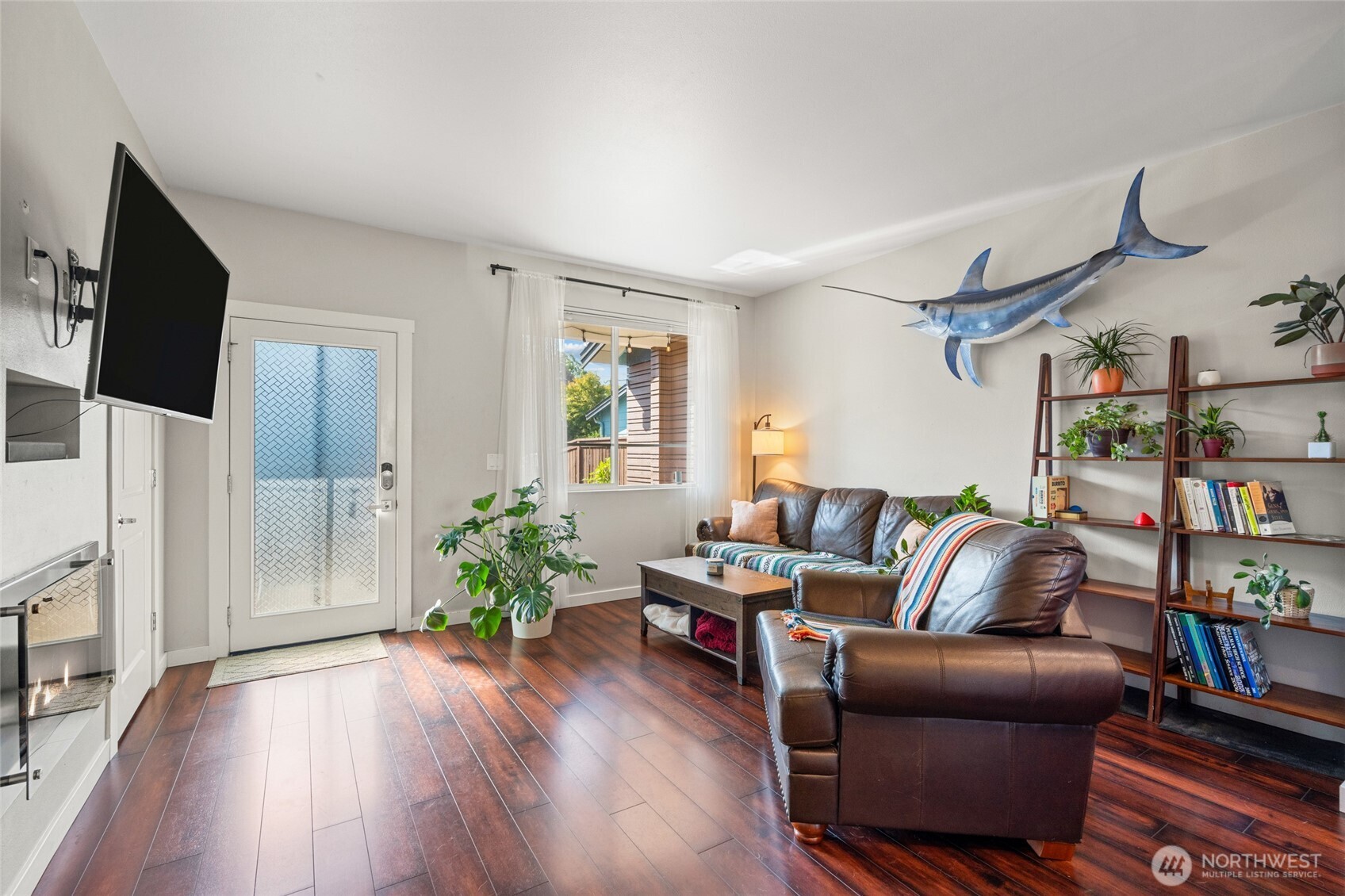 3013 South Nevada Street Seattle, WA 98108 - Photo 11 of 33 a living room with furniture and a flat screen tv