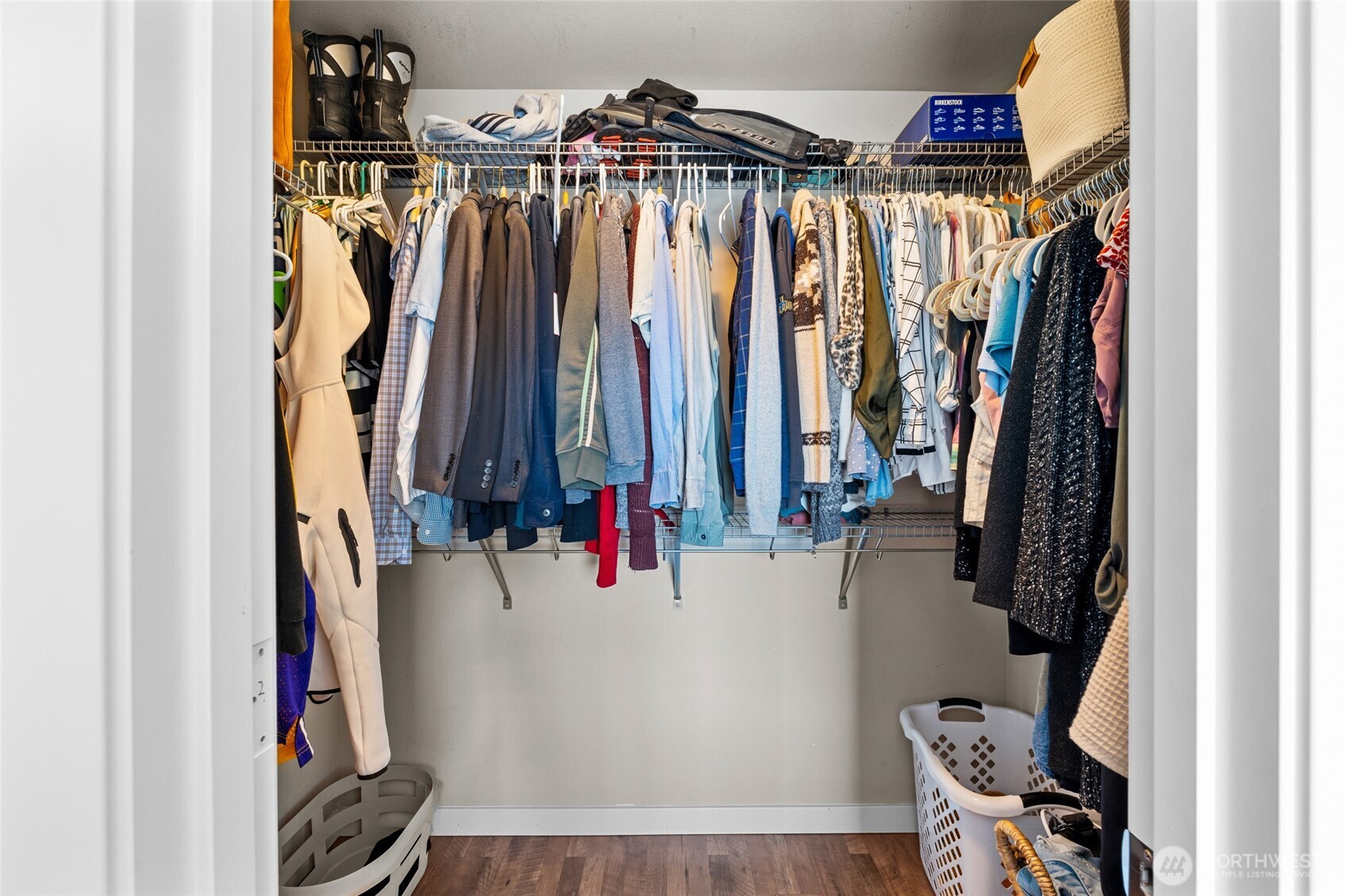 3013 South Nevada Street Seattle, WA 98108 - Photo 20 of 33 a view of walk in closet with clothes and shoes