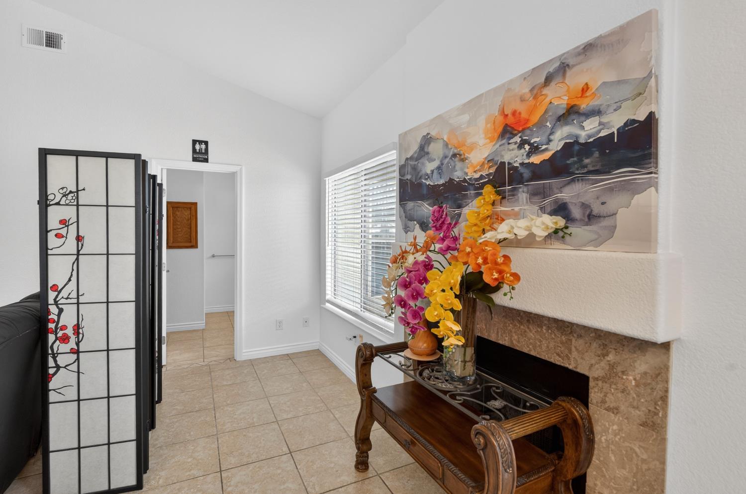 8148 Silverleaf Way Sacramento, CA 95829 - Photo 26 of 43 a room with furniture and flowers