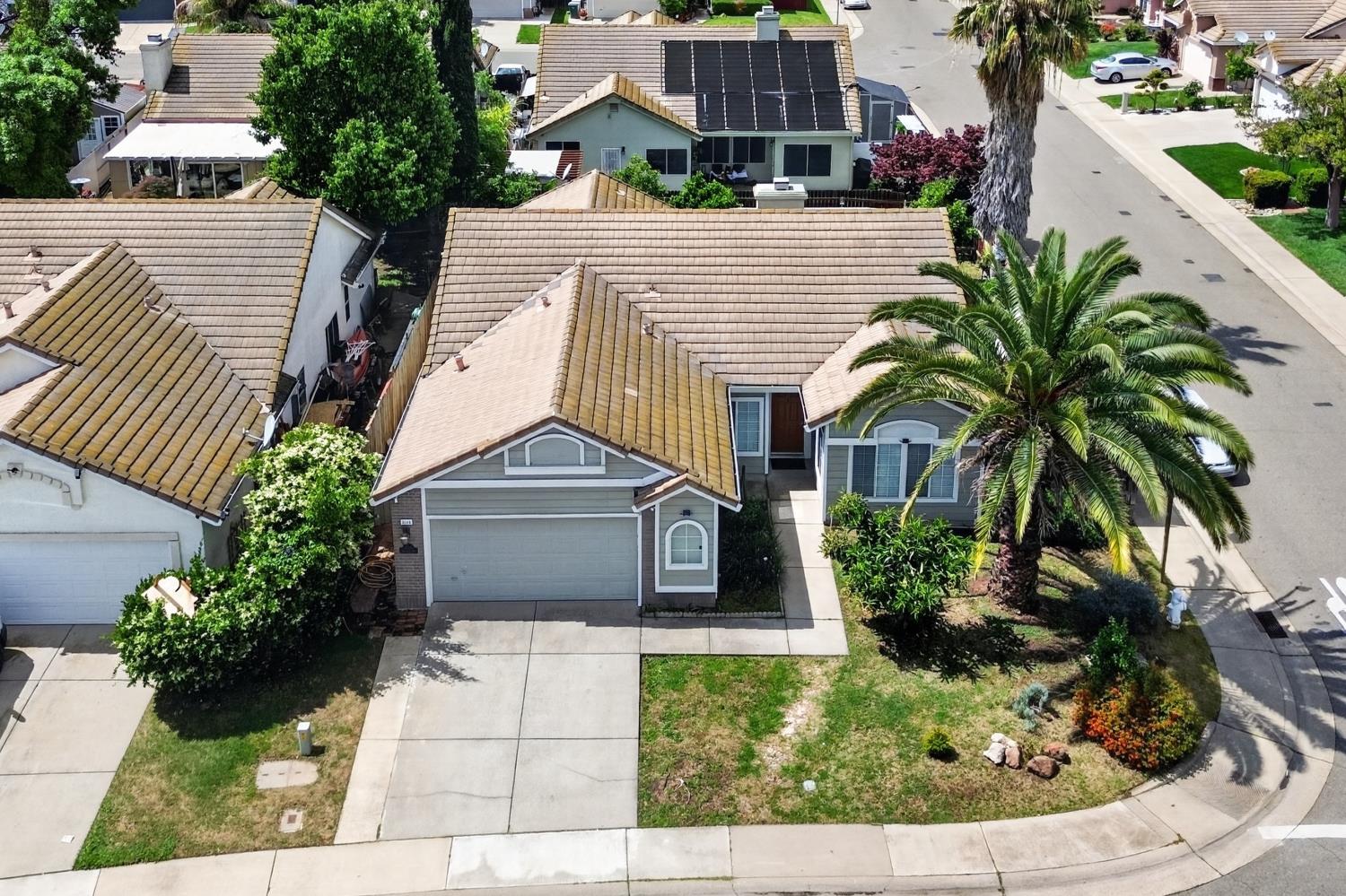 8148 Silverleaf Way Sacramento, CA 95829 - Photo 38 of 43 a front view of a house with a garden