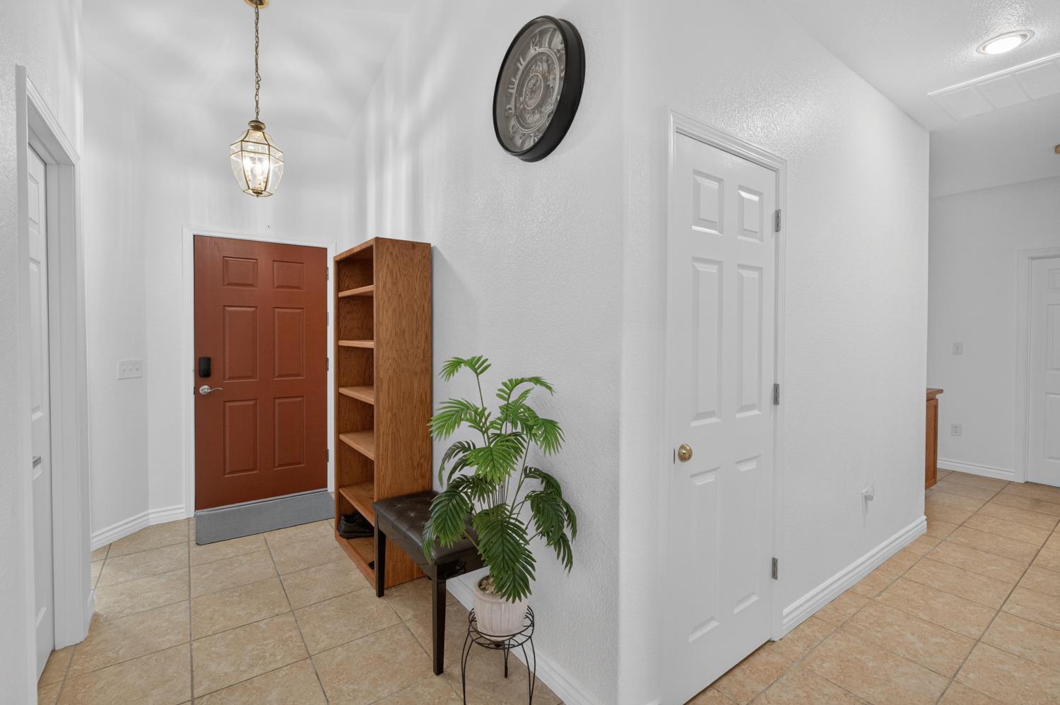 8148 Silverleaf Way Sacramento, CA 95829 - Photo 5 of 43 a view of entryway with livingroom