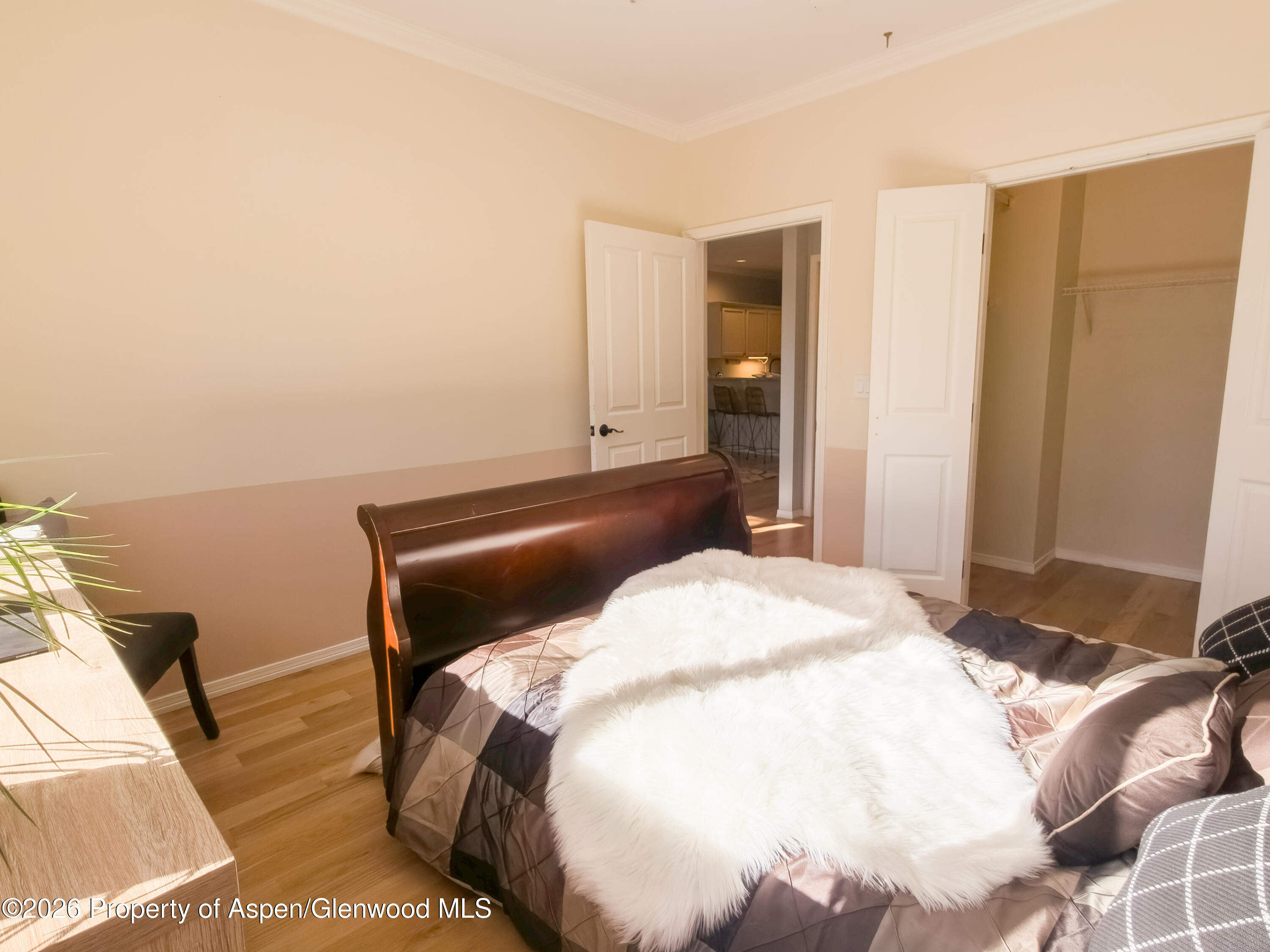 1400 East Valley Road, Unit 212 Basalt, CO 81621 - Photo 3 of 8 a bedroom with a bed and chair