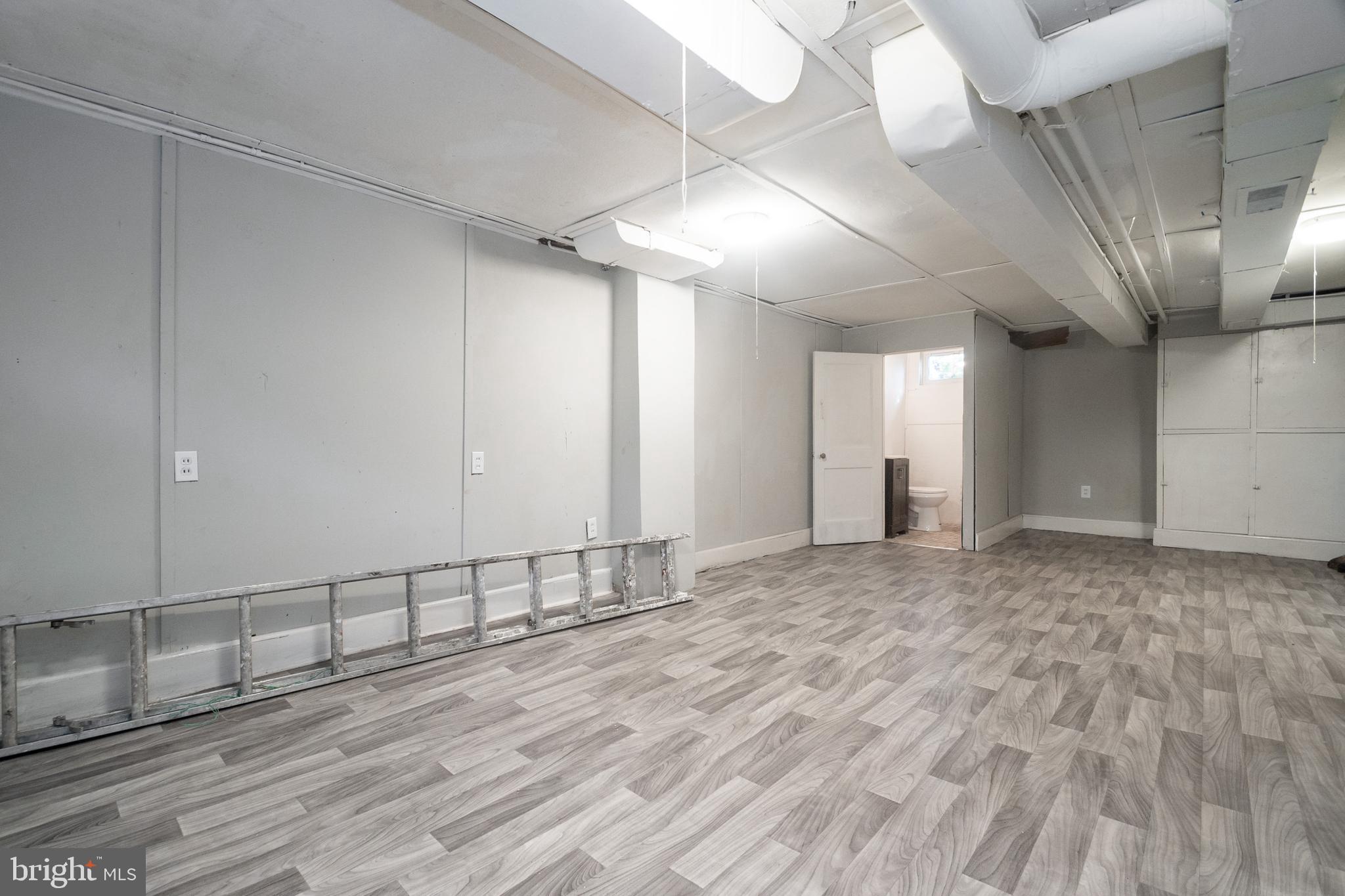48 Hillvale Road Baltimore, MD 21229 - Photo 23 of 25 a view of an empty room and wooden floor