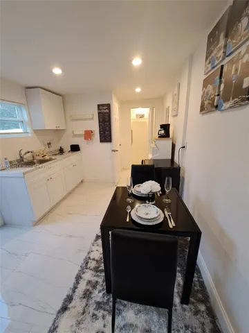 a bedroom with a bed and a cabinets