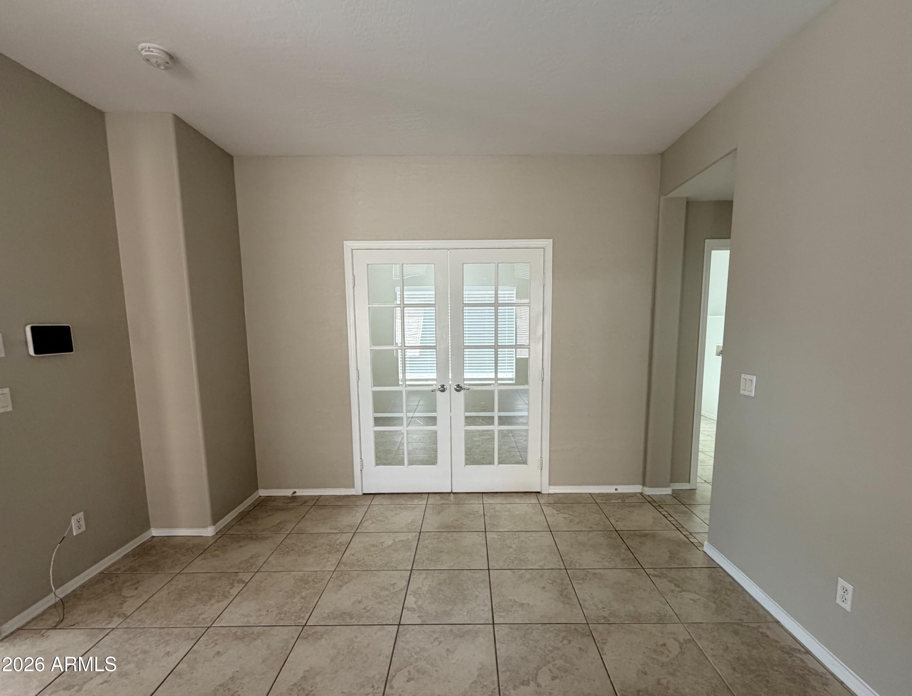 191 West Rio Drive Casa Grande, AZ 85122 - Photo 7 of 34 a view of an empty room with a window