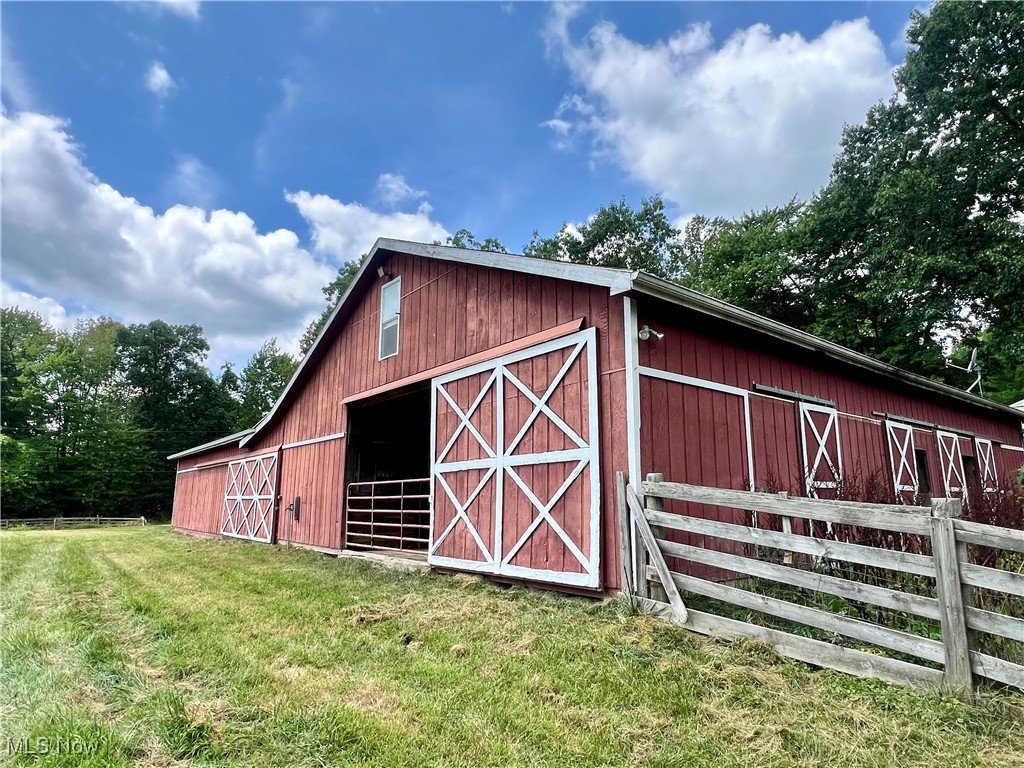 3840 Tabor Ridge Road Northeast Mineral City, OH 44656 - Photo 10 of 40 View of outdoor structure with a lawn