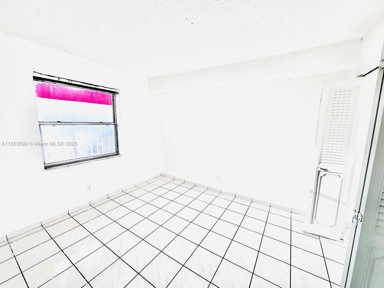 1750 West 46th Street, Unit 535 Hialeah, FL 33012 - Photo 21 of 28 a view of an empty room