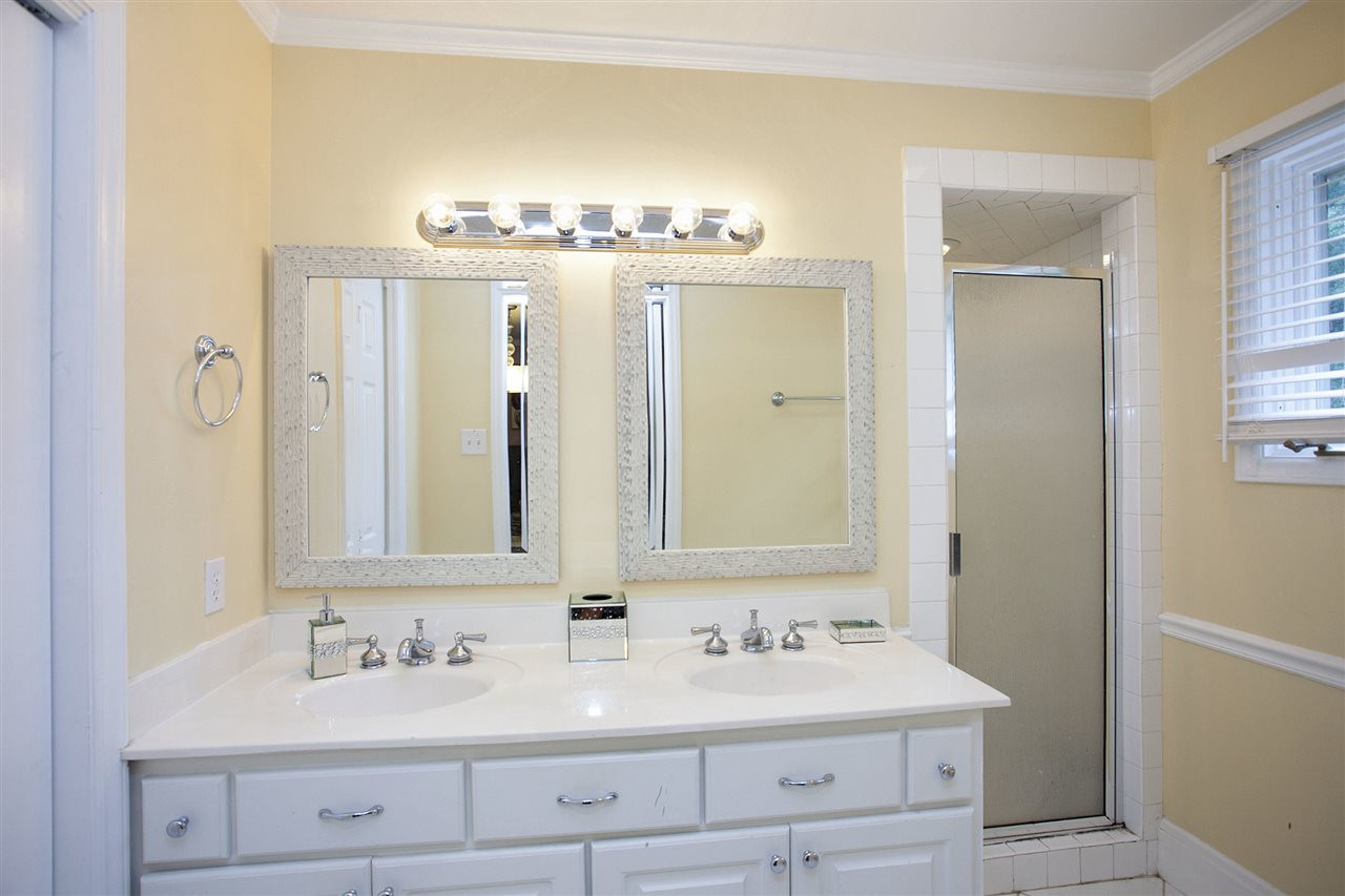 3829 Cole Mill Road Durham, NC 27712 - Photo 14 of 25 Master bathroom with double vanity and walk-in shower