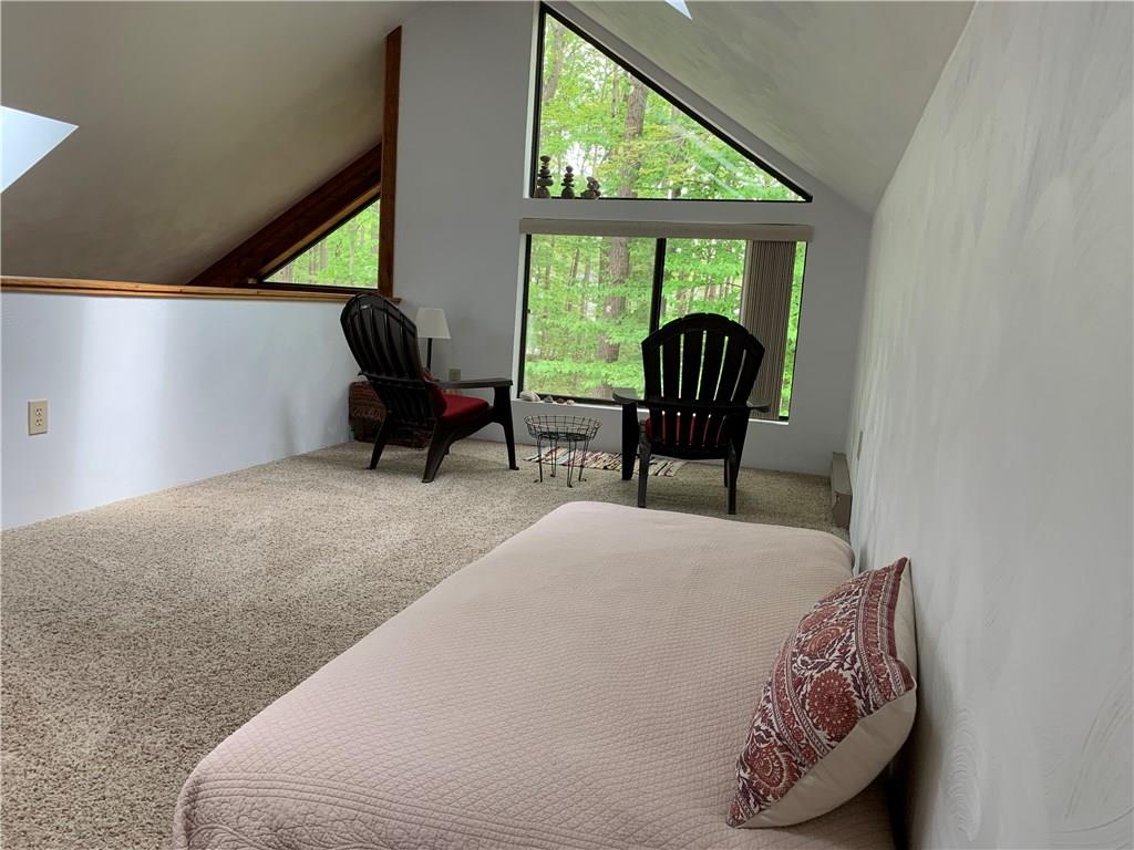 2713 Powder Ridge Road Hidden Valley, PA 15502 - Photo 18 of 30 a living room with furniture and a large window