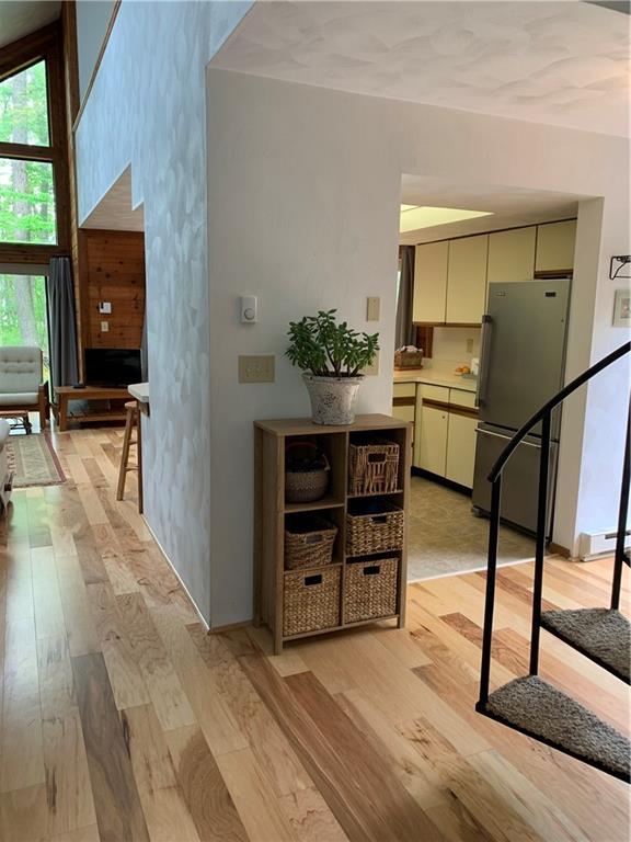 2713 Powder Ridge Road Hidden Valley, PA 15502 - Photo 20 of 30 a view of a workspace with furniture and a window