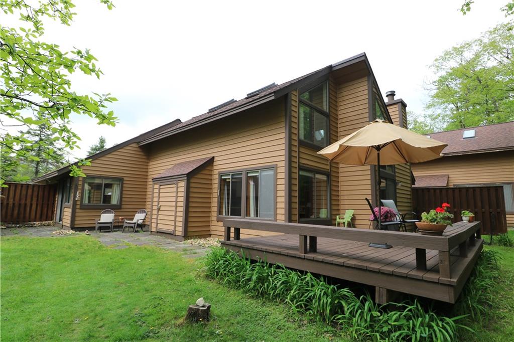 2713 Powder Ridge Road Hidden Valley, PA 15502 - Photo 22 of 30 a backyard of a house with yard table and chairs