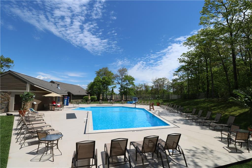 2713 Powder Ridge Road Hidden Valley, PA 15502 - Photo 25 of 30 a view of swimming pool with outdoor seating and plants