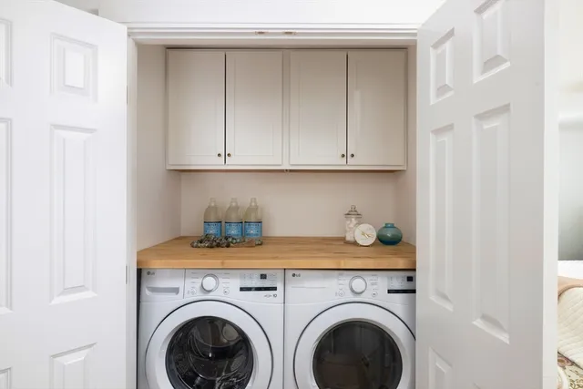 a utility room with dryer and washer