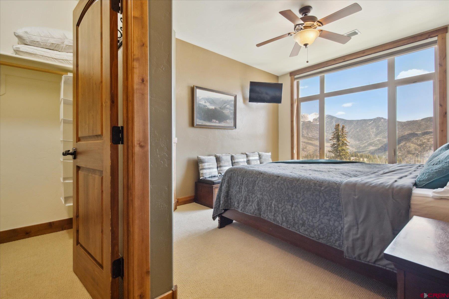 545 Skier Place, Unit 104 Durango, CO 81301 - Photo 37 of 45 a bedroom with a bed and a window