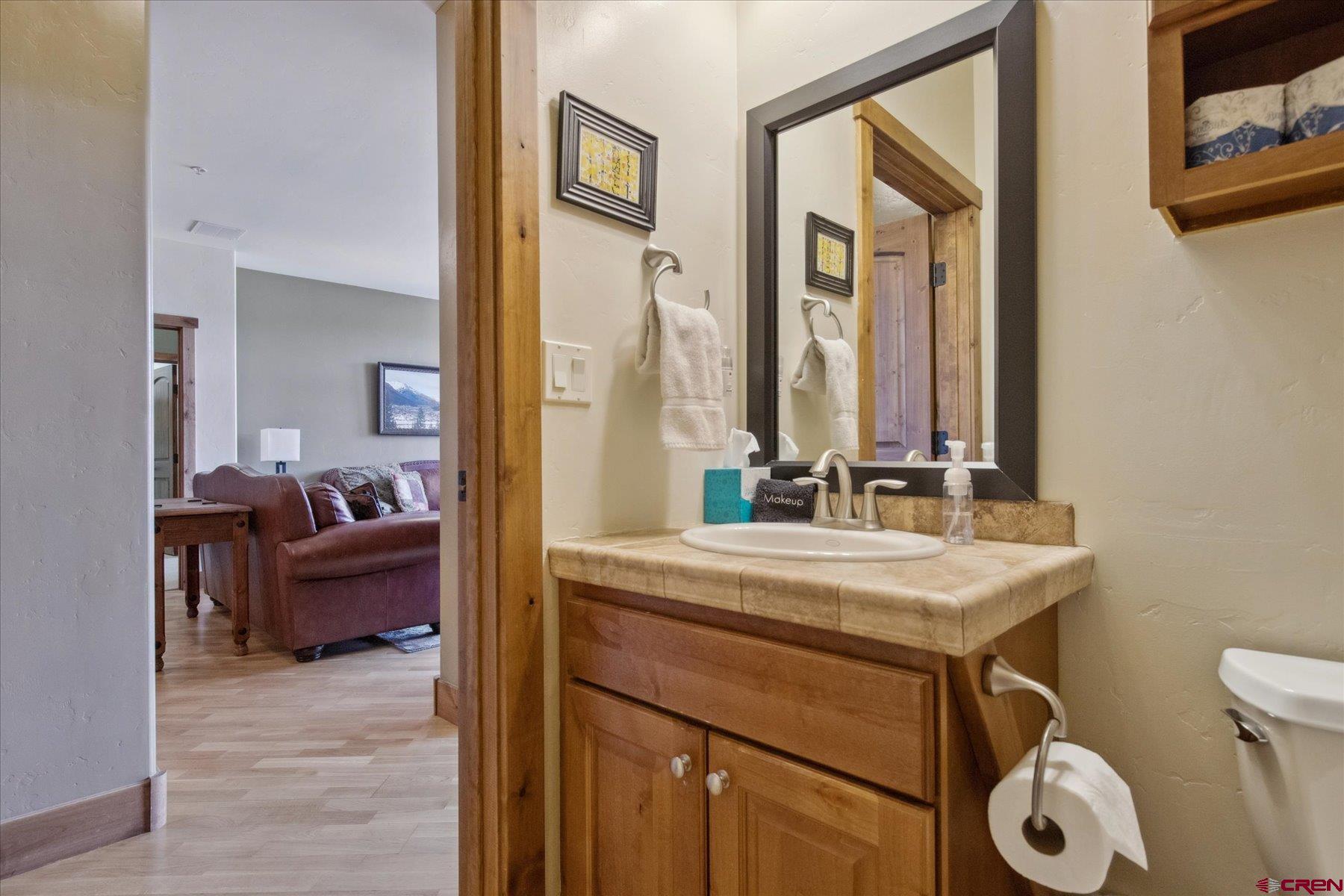 545 Skier Place, Unit 104 Durango, CO 81301 - Photo 10 of 45 a en suite bathroom with a sink and a mirror