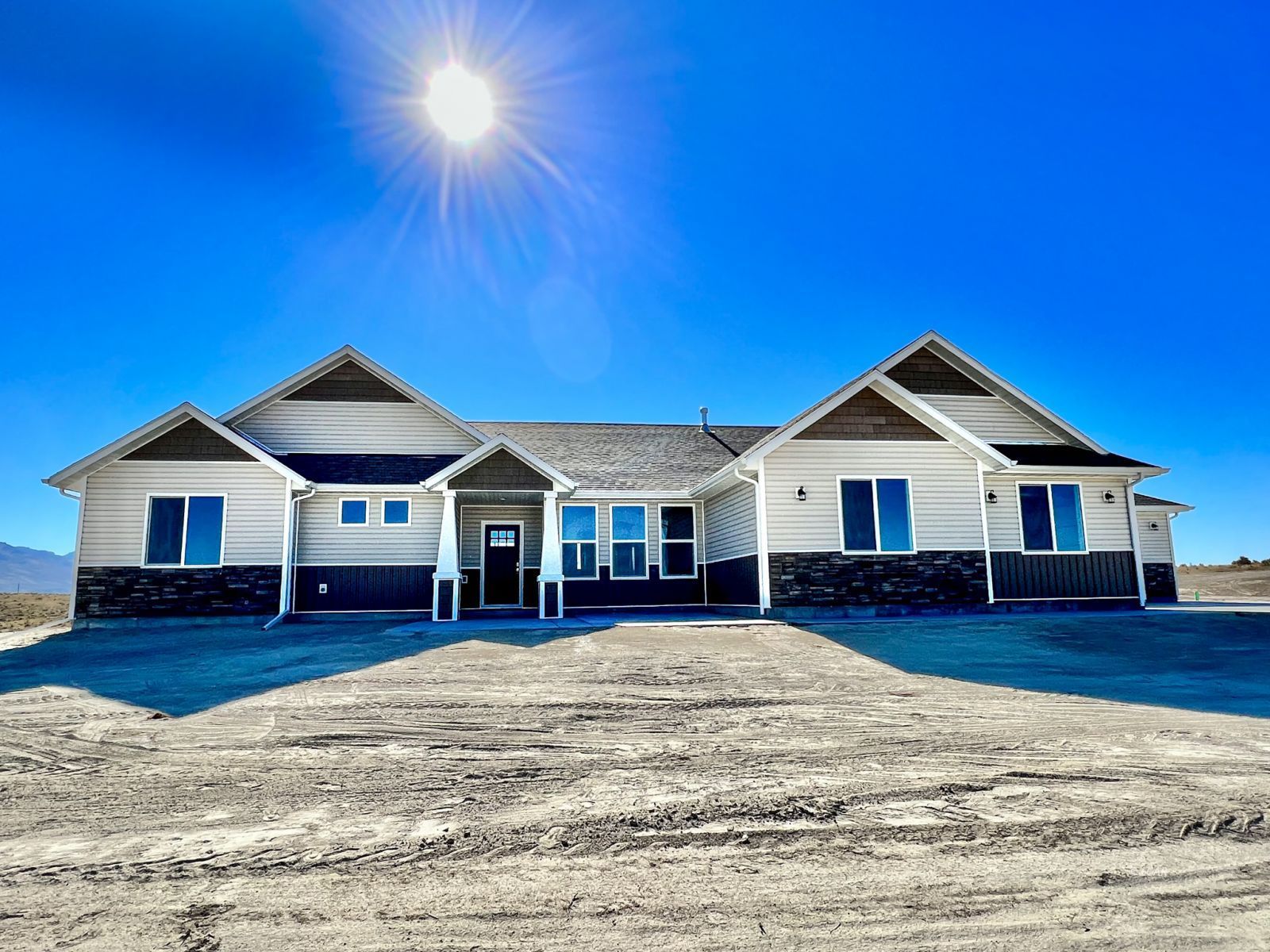 457 Sun Vly Road Spring Creek, NV 89815 - Photo 1 of 33 a view of a house with a yard