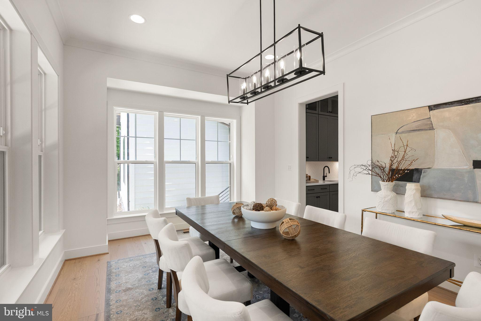 11800 Valley Road Fairfax, VA 22033 - Photo 16 of 76 a view of a kitchen area with furniture and wooden floor