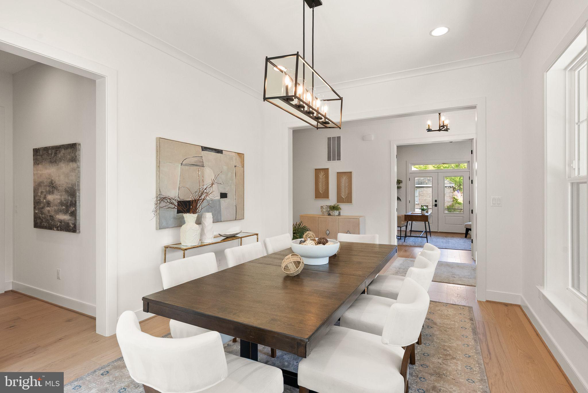 11800 Valley Road Fairfax, VA 22033 - Photo 17 of 76 a view of a dining room with furniture wooden floor and a chandelier