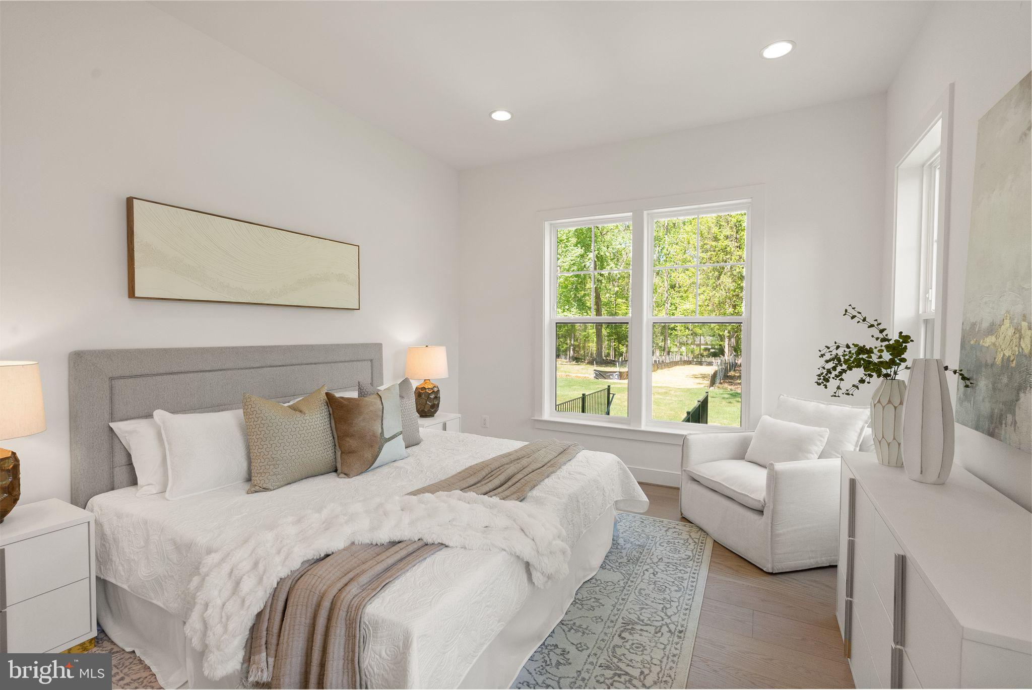 11800 Valley Road Fairfax, VA 22033 - Photo 21 of 76 a bedroom with a bed and a couch