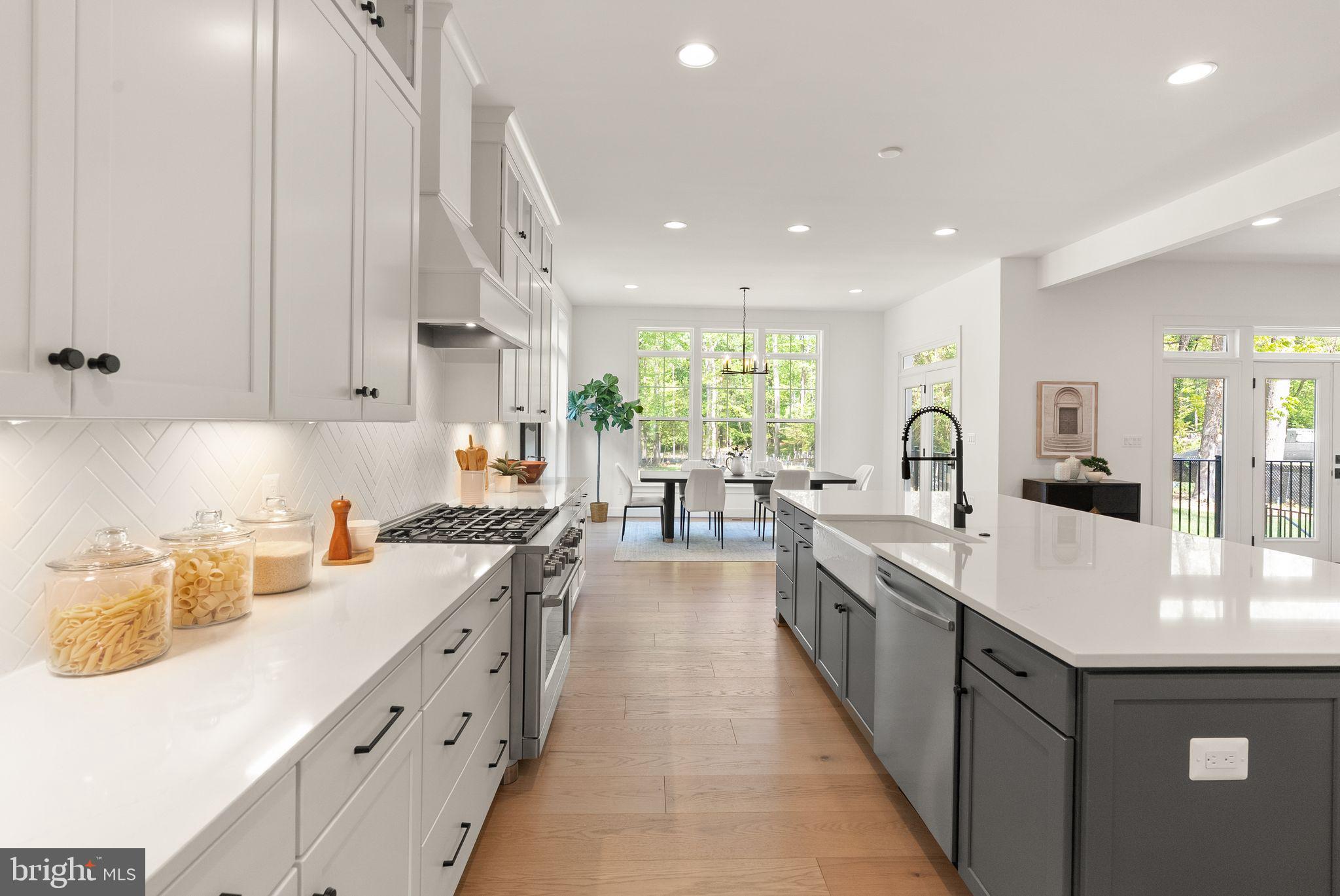11800 Valley Road Fairfax, VA 22033 - Photo 35 of 76 a large kitchen with stainless steel appliances lots of counter space and a sink