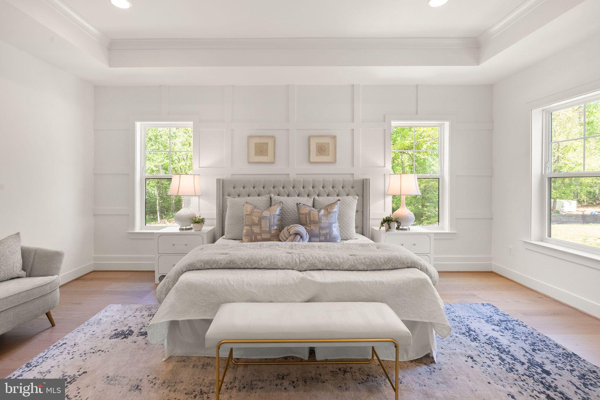 11800 Valley Road Fairfax, VA 22033 - Photo 44 of 76 a bedroom with a bed and wooden floor