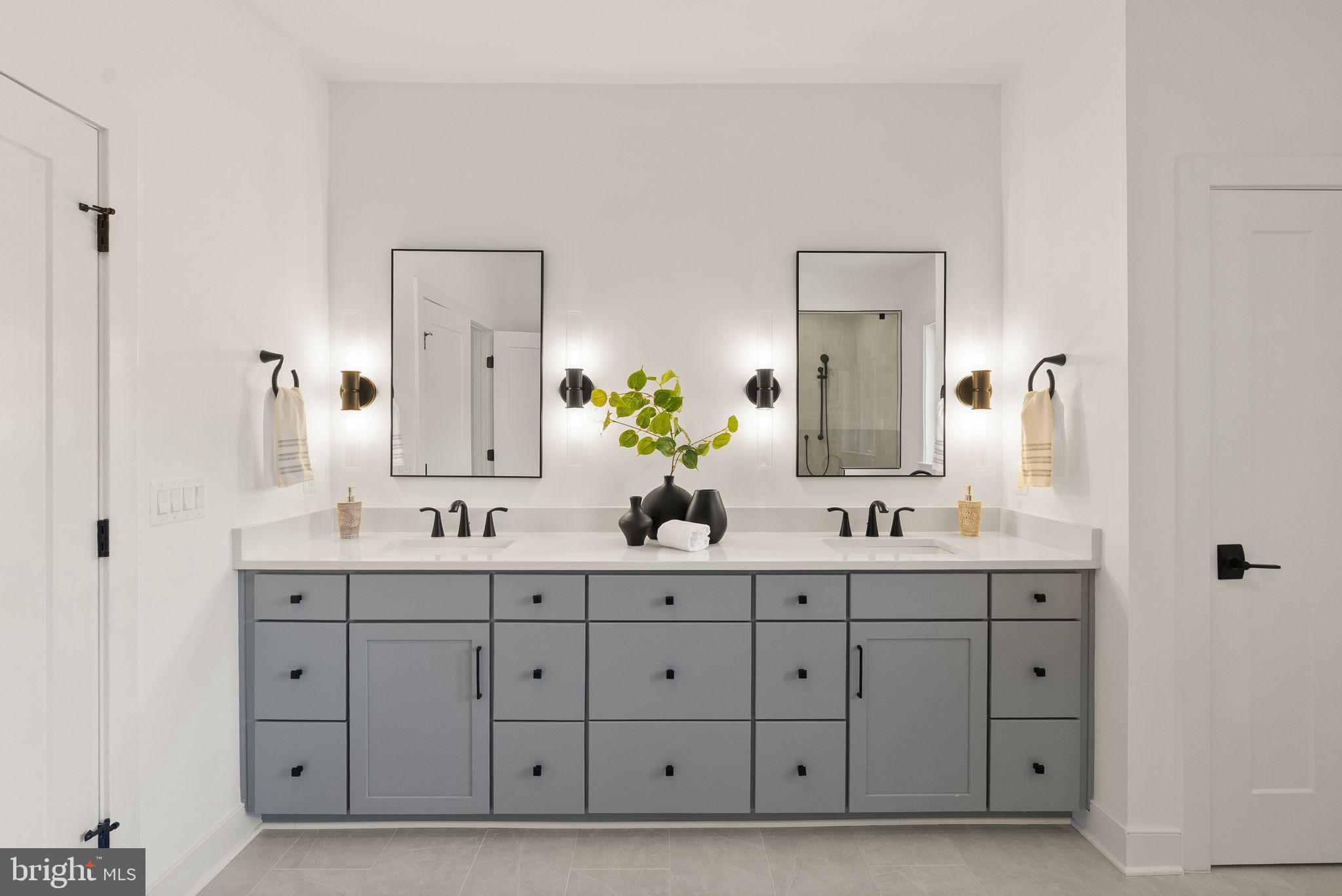 11800 Valley Road Fairfax, VA 22033 - Photo 45 of 76 a spacious bathroom with double sink and a mirror