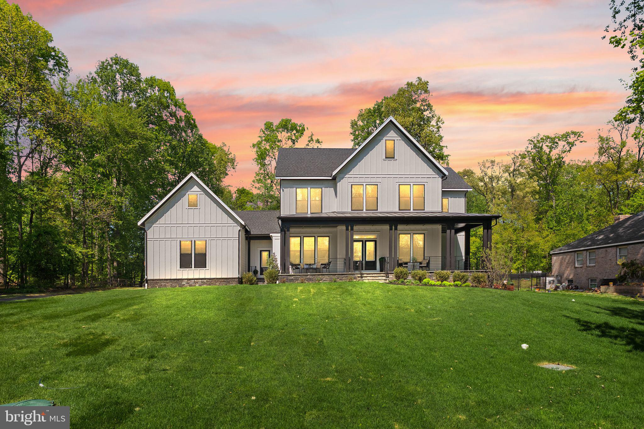 11800 Valley Road Fairfax, VA 22033 - Photo 6 of 76 a front view of a house with a yard