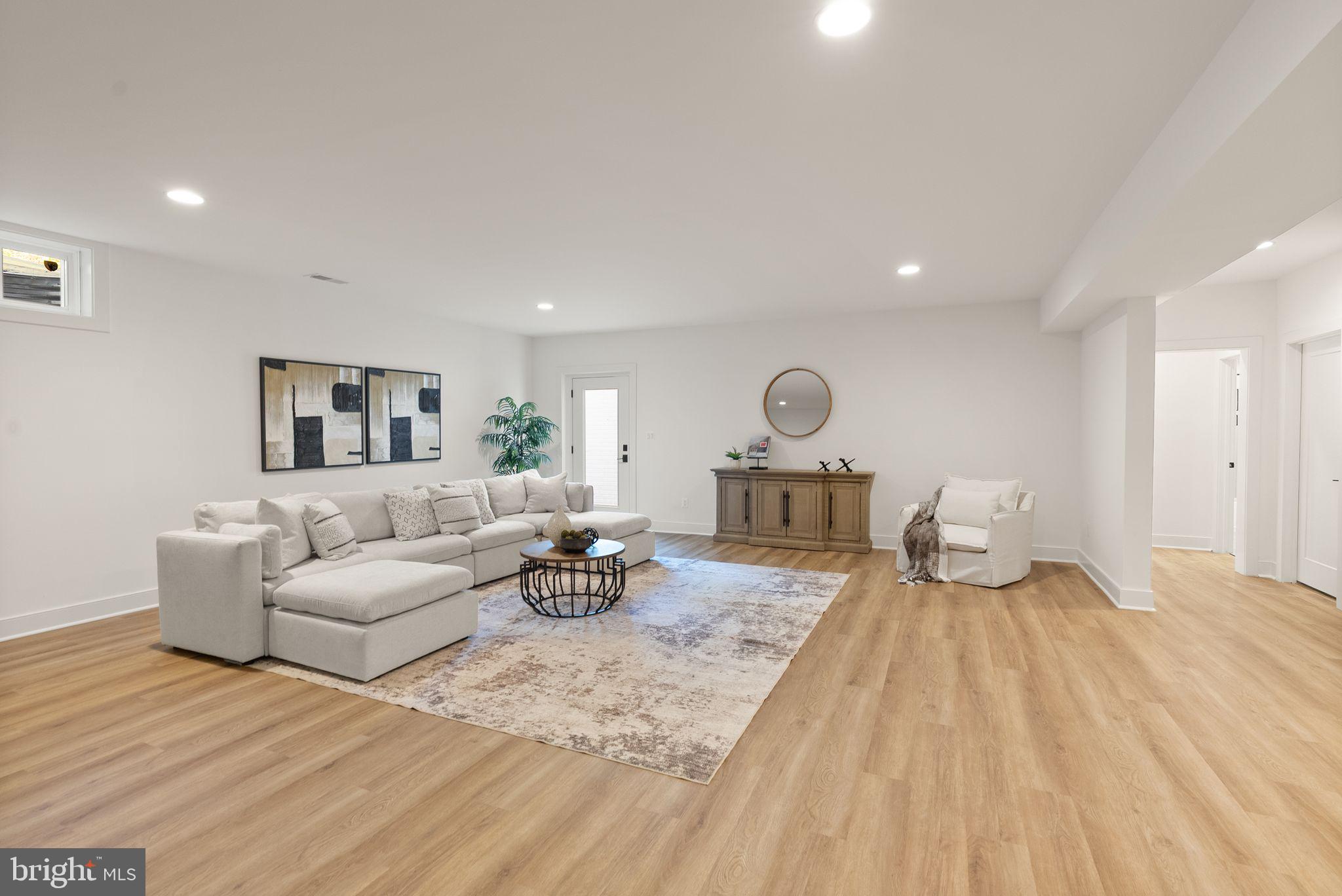 11800 Valley Road Fairfax, VA 22033 - Photo 62 of 76 a living room with furniture and a wooden floor
