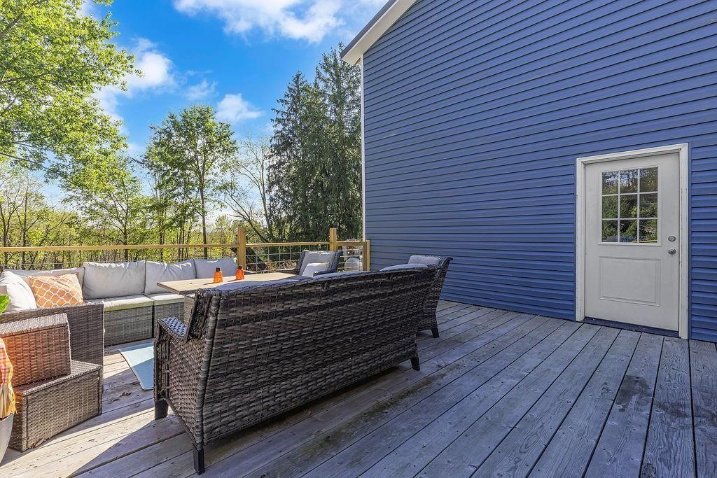 6437 Tuscarawas Road Midland, PA 15059 - Photo 26 of 35 Newer additional deck is the best place to kick back and view nature in back yard.