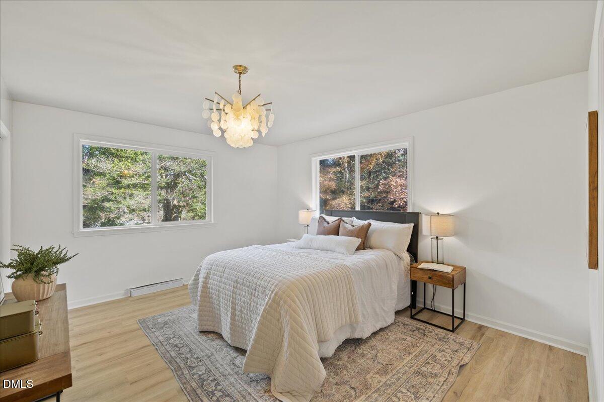 1615 Carbonton Road Sanford, NC 27330 - Photo 15 of 43 a bedroom with a bed and a window