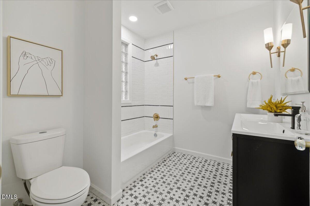 1615 Carbonton Road Sanford, NC 27330 - Photo 22 of 43 a bathroom with a sink a toilet and shower