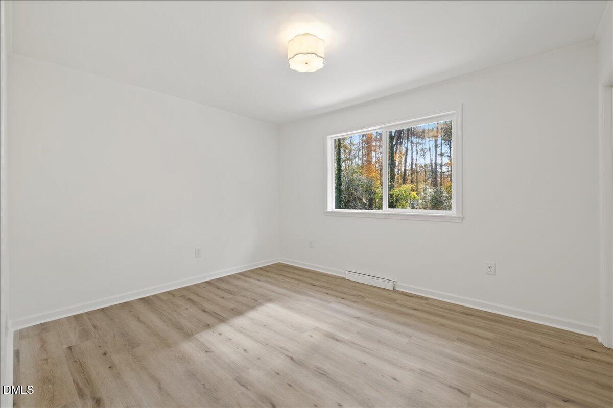 1615 Carbonton Road Sanford, NC 27330 - Photo 24 of 43 an empty room with a window
