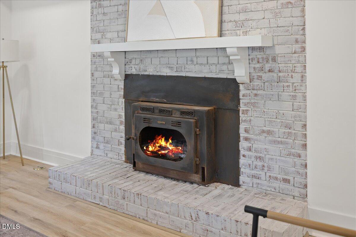 1615 Carbonton Road Sanford, NC 27330 - Photo 30 of 43 a living room with a fireplace