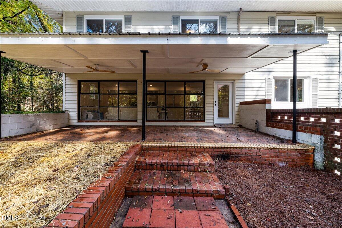1615 Carbonton Road Sanford, NC 27330 - Photo 38 of 43 a view of a house with a patio