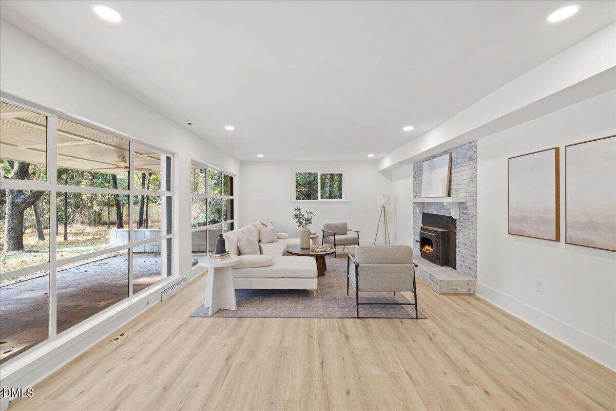 1615 Carbonton Road Sanford, NC 27330 - Photo 3 of 43 a living room with furniture and a large window
