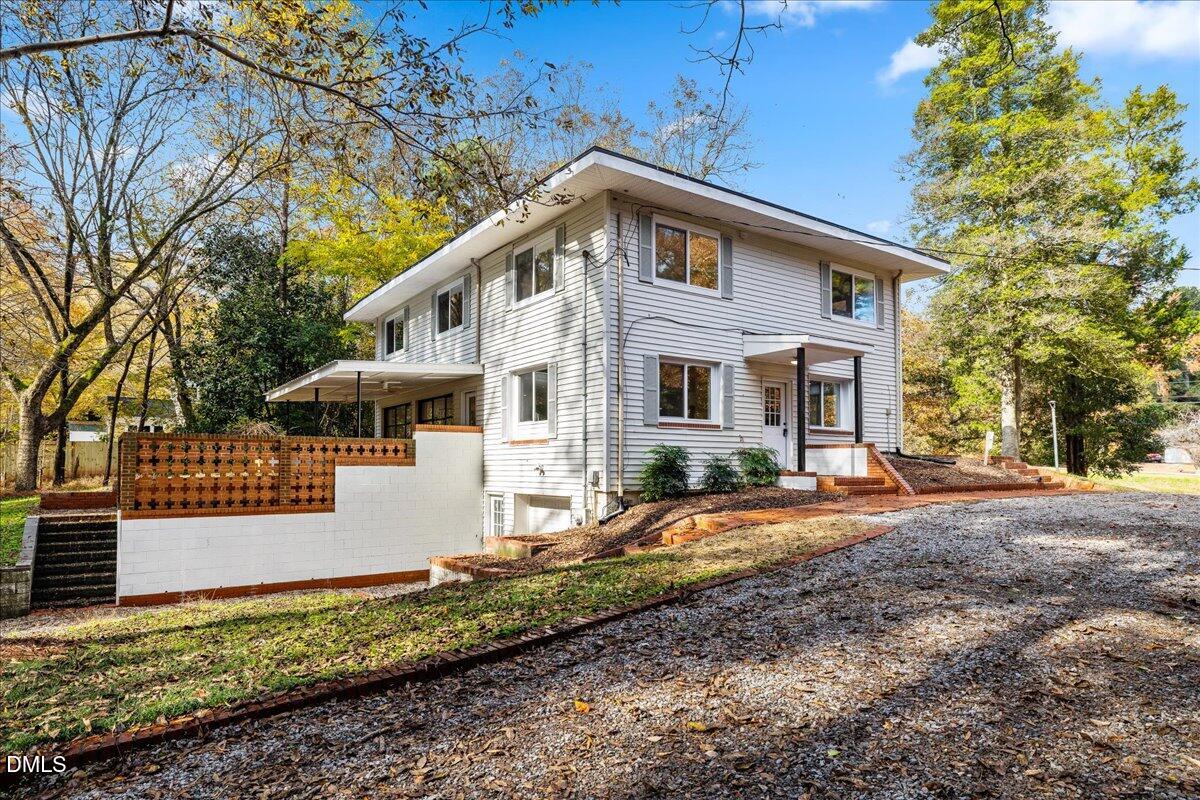 1615 Carbonton Road Sanford, NC 27330 - Photo 41 of 43 a front view of a house with a yard