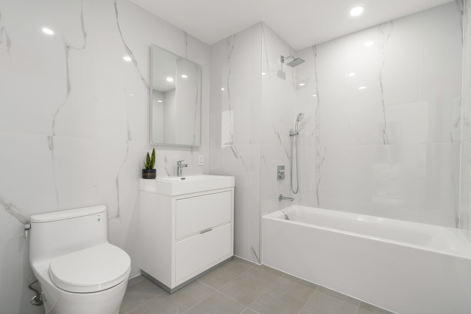 379 Ocean Parkway, Unit 3B Brooklyn, NY 11218 - Photo 14 of 23 a bathroom with a toilet a sink and a bathtub
