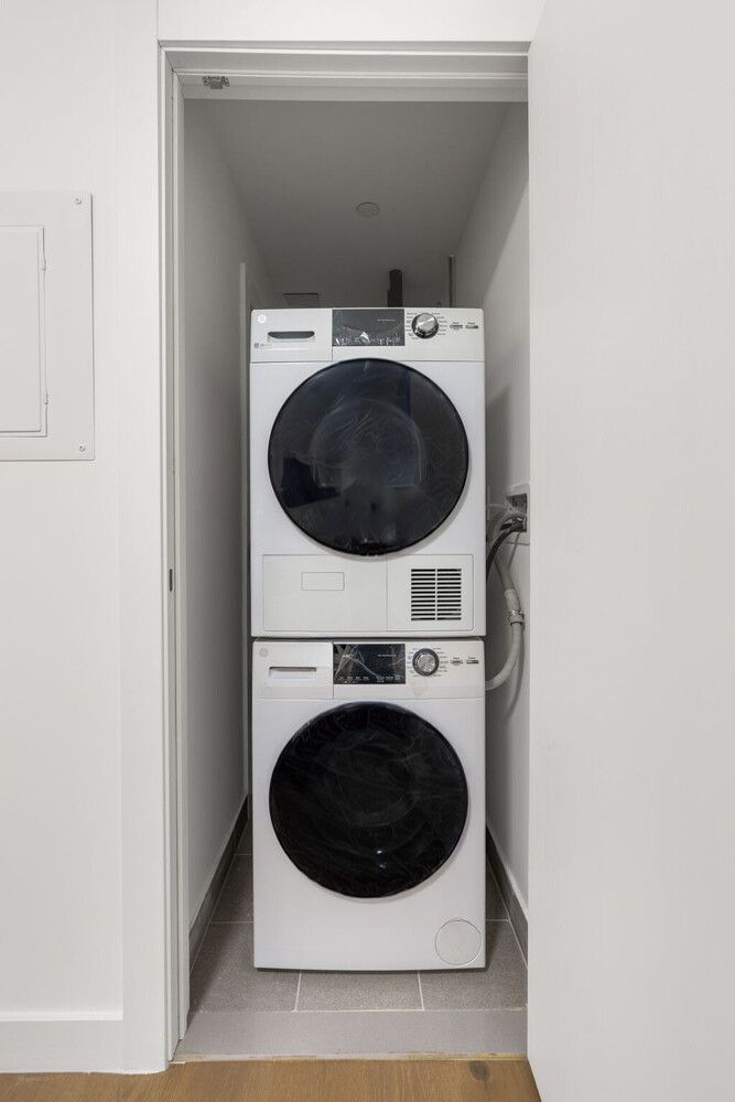 379 Ocean Parkway, Unit 3B Brooklyn, NY 11218 - Photo 15 of 23 a utility room with dryer and washer