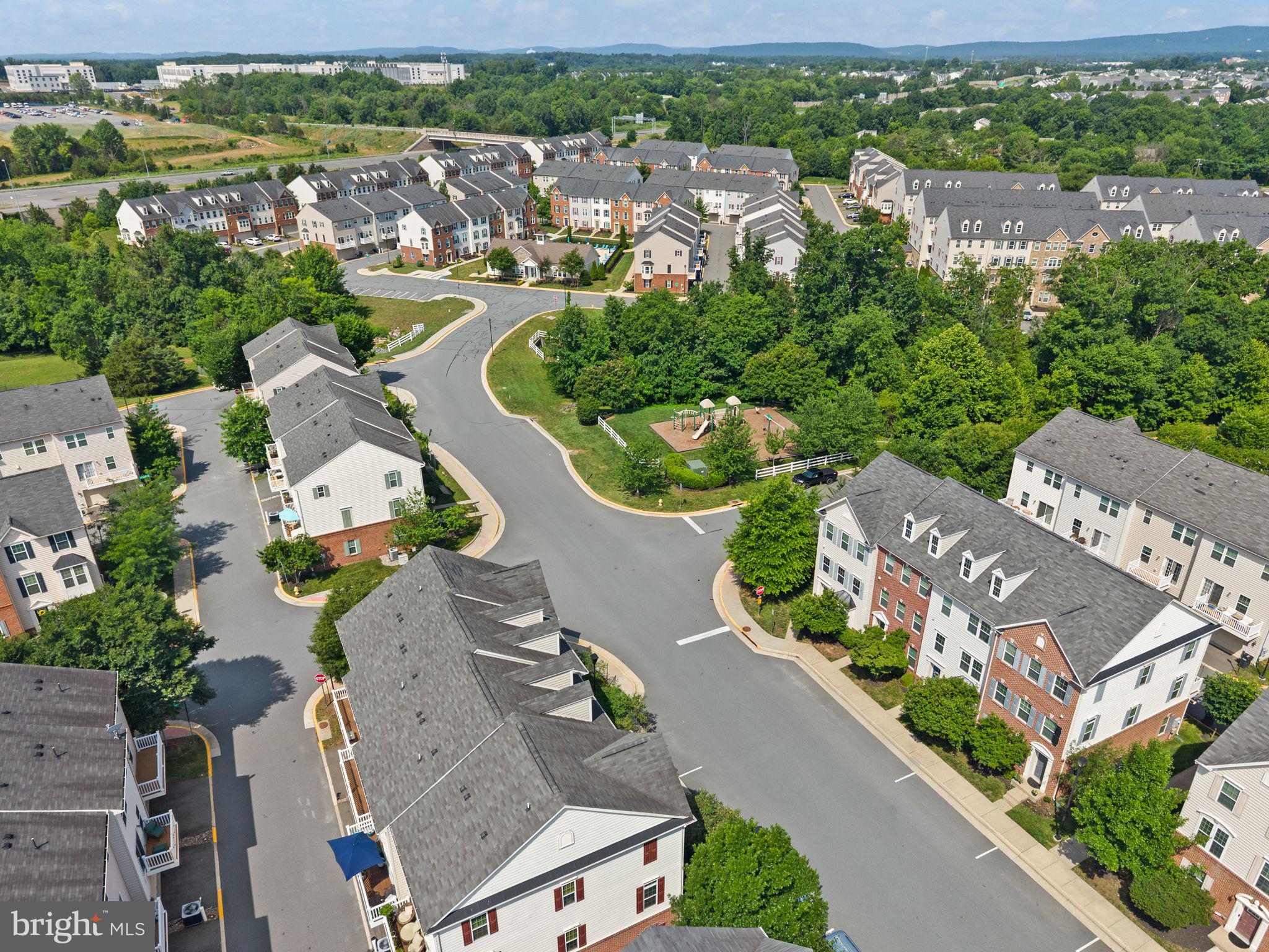 7015 Trek Way Gainesville, VA 20155 - Photo 52 of 56 7015 front left, tot lot mid right, pool in rear