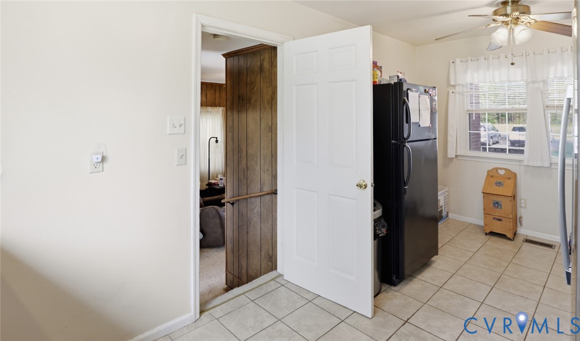 598 Old Wagner Road Petersburg, VA 23805 - Photo 14 of 43 Kitchen featuring light-toned square tile flooring