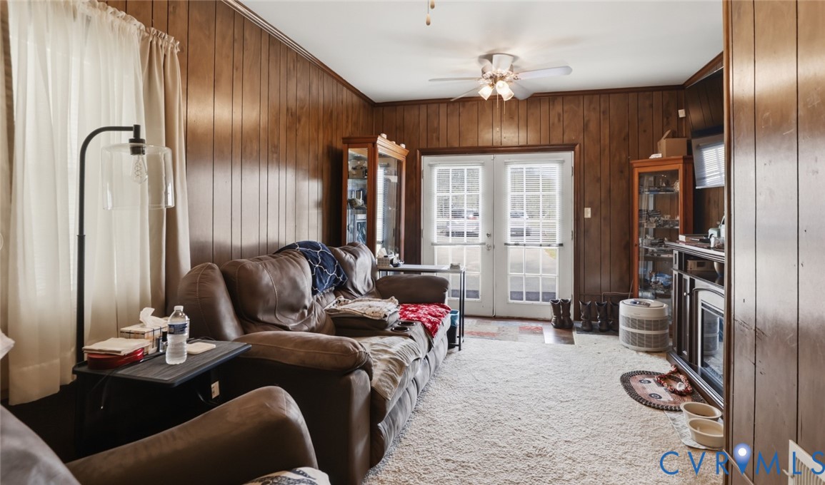 598 Old Wagner Road Petersburg, VA 23805 - Photo 16 of 43 Living area featuring wood paneling throughout
