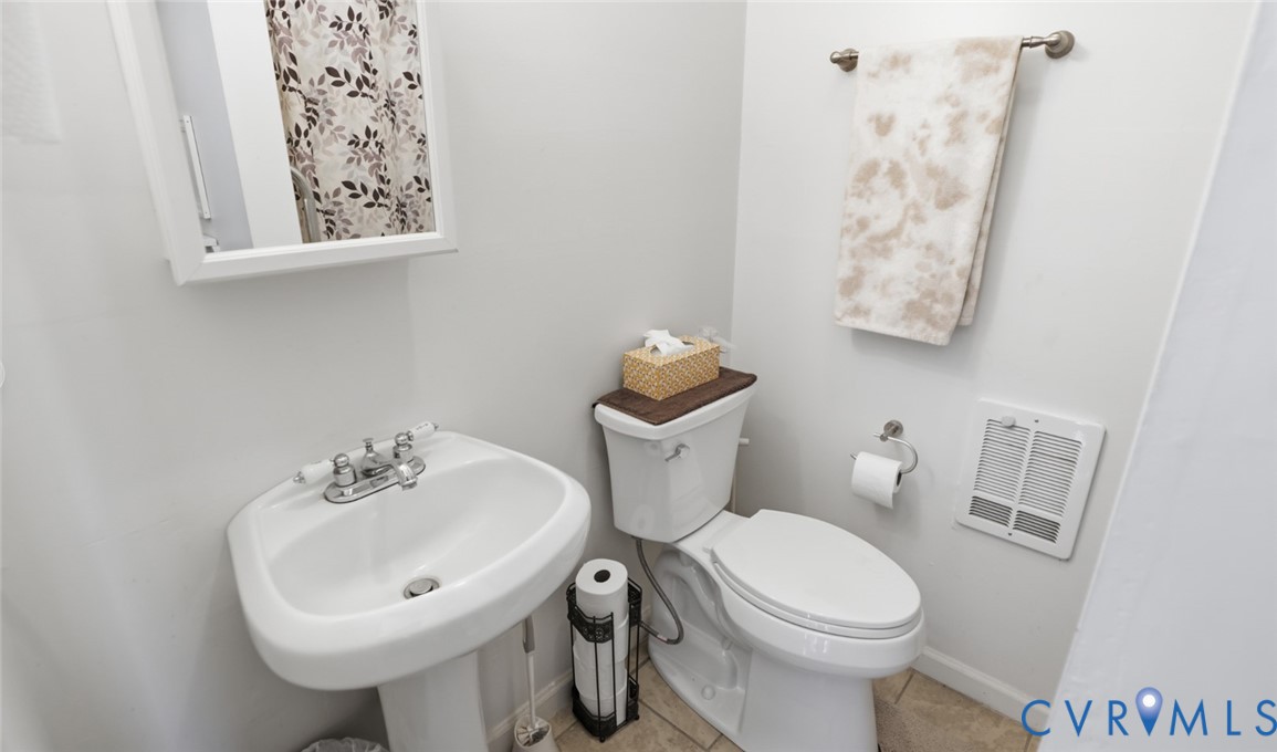 598 Old Wagner Road Petersburg, VA 23805 - Photo 18 of 43 Pedestal sink with chrome faucet, wall-mounted mir
