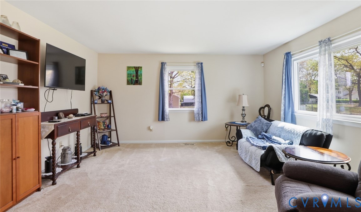 598 Old Wagner Road Petersburg, VA 23805 - Photo 19 of 43 Spacious interior room with light beige wall paint
