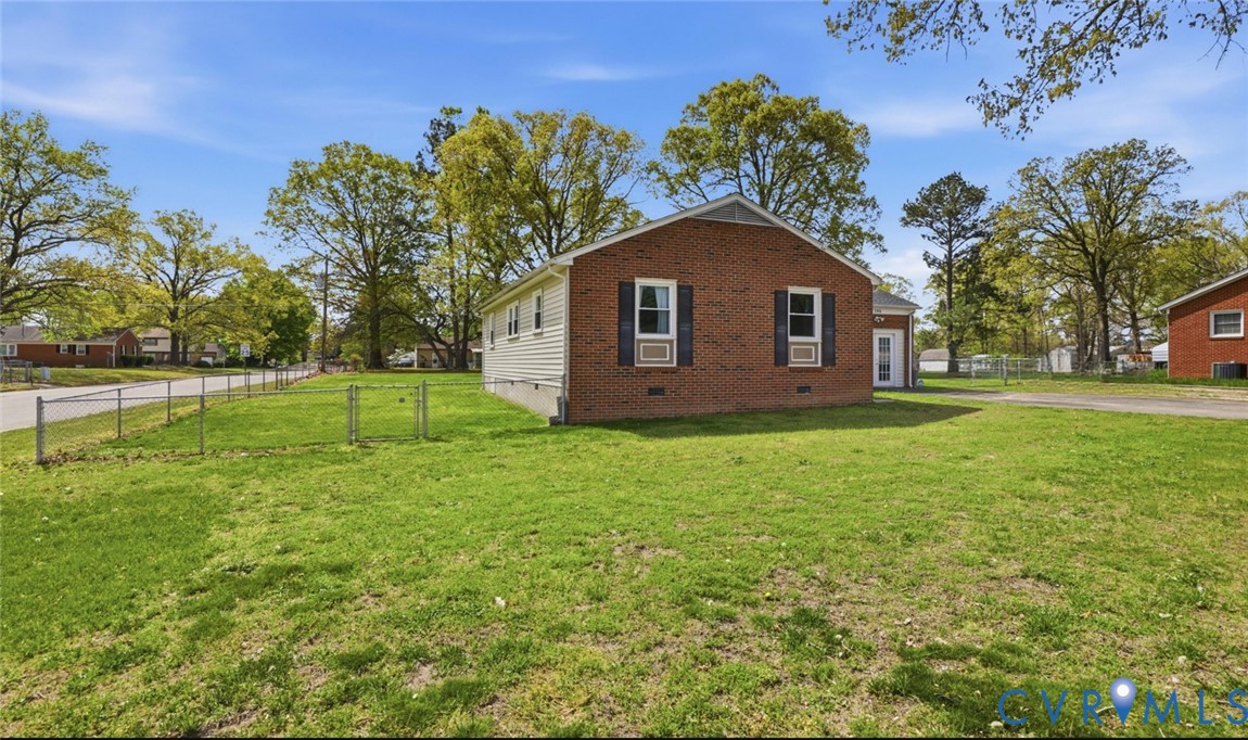 598 Old Wagner Road Petersburg, VA 23805 - Photo 3 of 43 Brick exterior with white siding accents and a pit