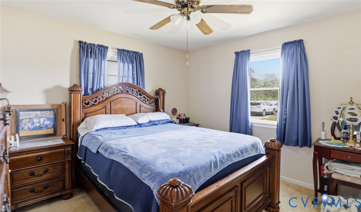 598 Old Wagner Road Petersburg, VA 23805 - Photo 32 of 43 Bedroom with neutral wall color and carpet floorin