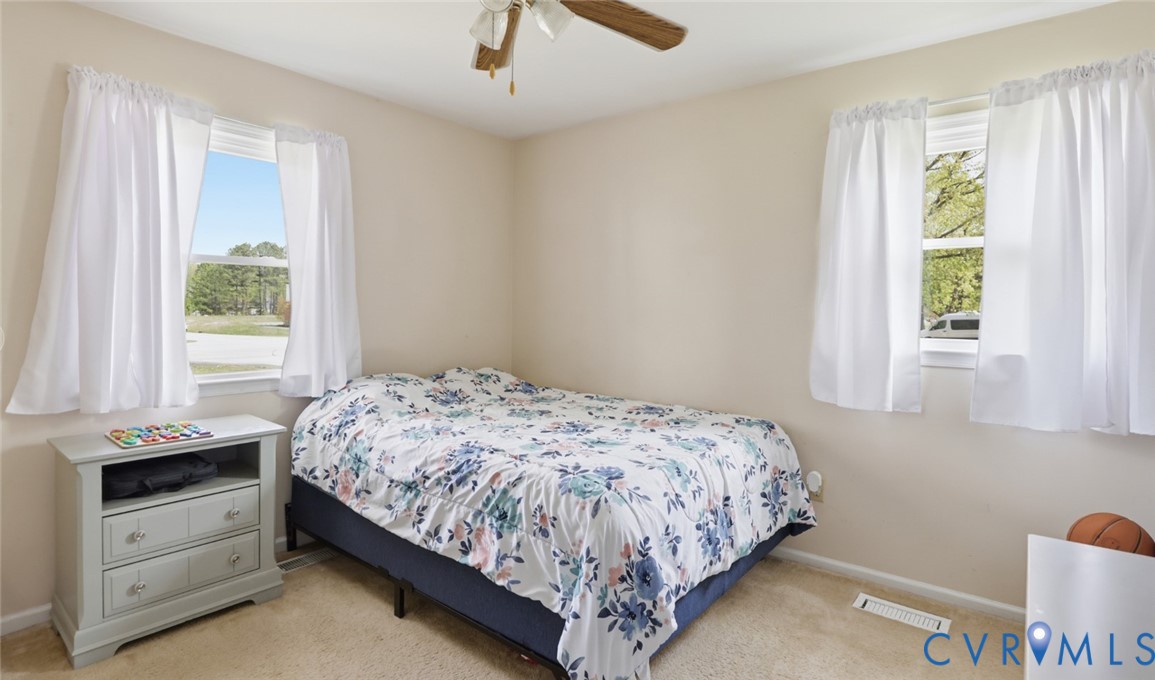 598 Old Wagner Road Petersburg, VA 23805 - Photo 34 of 43 Bedroom with two windows, light beige wall paint,