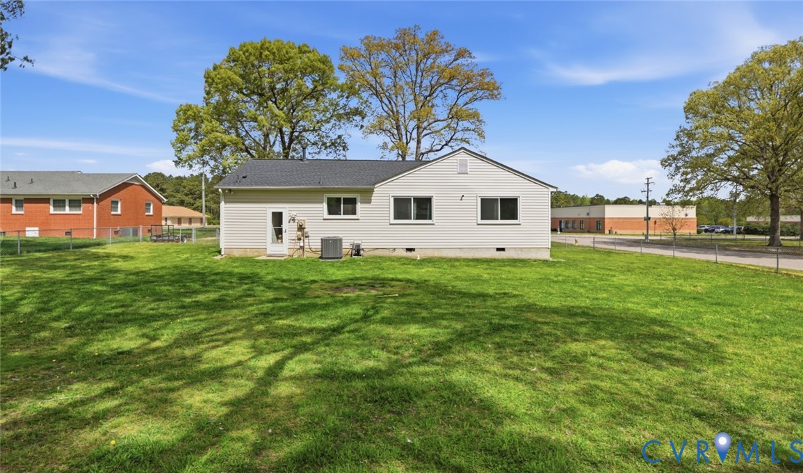 598 Old Wagner Road Petersburg, VA 23805 - Photo 38 of 43 Expansive rear lawn featuring a white vinyl-sided